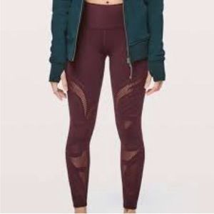 Lululemon dark eggplant leggings with cutout floral design - size 8